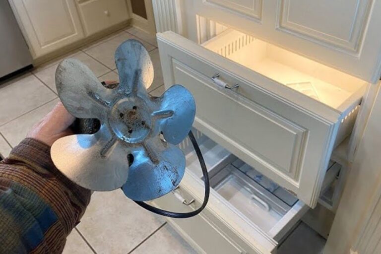 Sub-Zero refrigerator drawer opened during evaporator fan motor repair and replacement troubleshooting